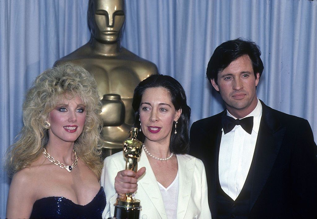 Morgan Fairchild with Milena Canonero and Robert Hays at 54th Annual Academy Awards, 1982