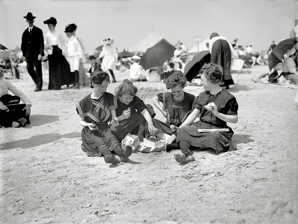 Picnicing on the beach, Coney Island, New York, circa 1905