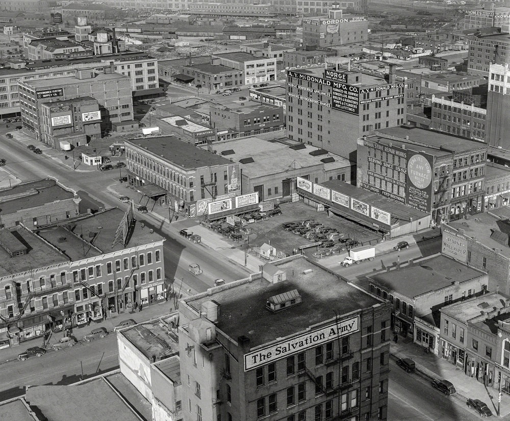A bird's-eye view of, among other attractions, Tri-City Barber, Omaha, Nebraska, November 1938