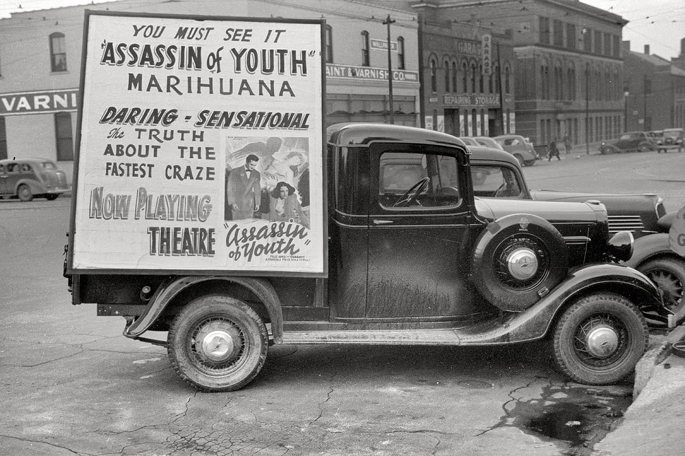 Truck carrying movie poster, Omaha, November 1938