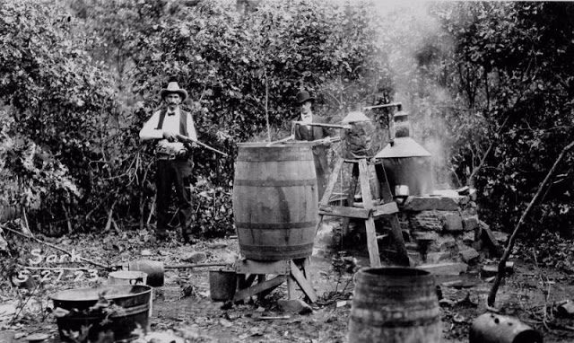 Lawmen seize illegal moonshine in Osage County in 1923 at the time of the murders.