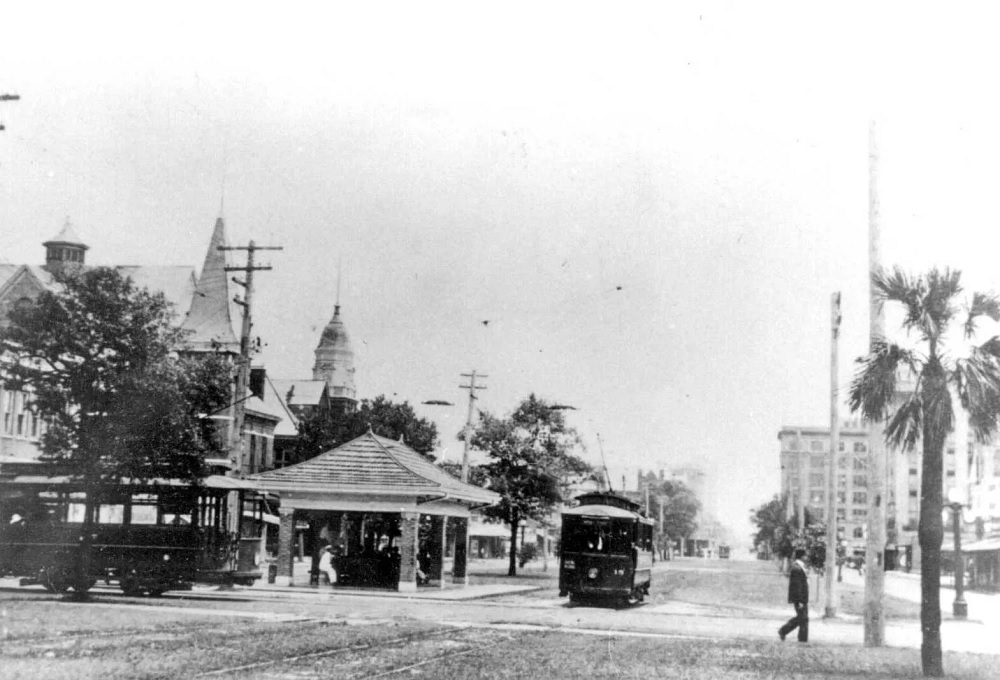 Two streetcars meet at Palafox and Gregory Streets in Pensacola, 1910s