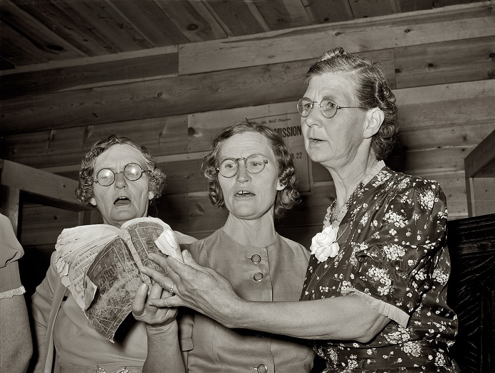 Three members of the ladies' quintet at a community sing in Pie Town, New Mexico, June 1940