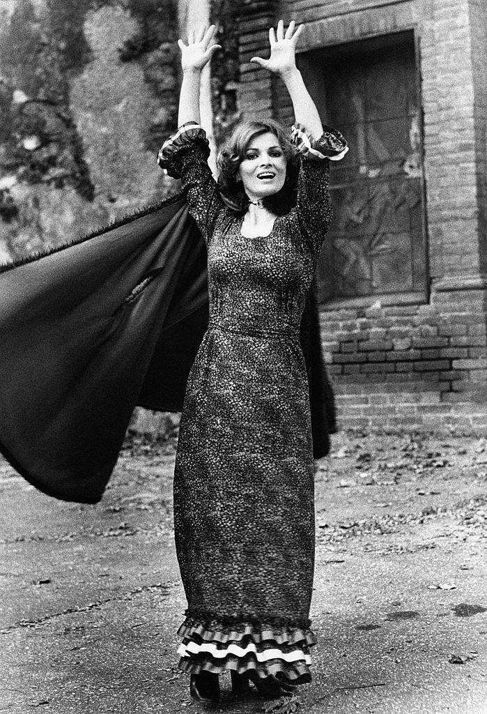 Scilla Gabel posing with her arms up, 1970s