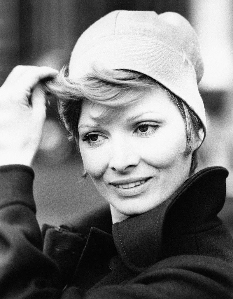 Scilla Gabel arranging her hair, Milan, 1970s