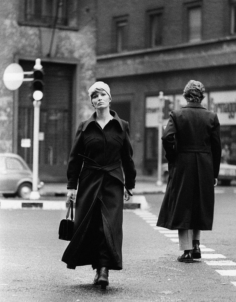 Scilla Gabel crossing Via Larga, Milan, 1970s