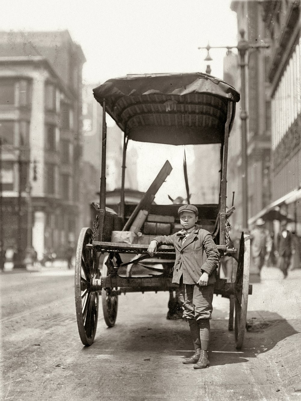 Adams Express Company, one of the many young boys working as assistants on express wagons, St. Louis, 1910