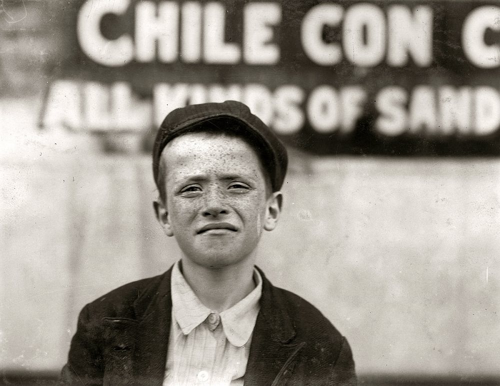 Johnnie Burns, a newsie who sells on Grand Avenue, St. Louis, May 1910