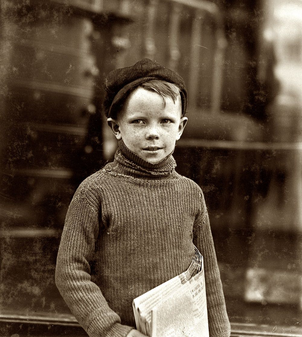 An eight year old newsie named Gurley at 18th & Washington Streets, St. Louis, Missouri, May 1910