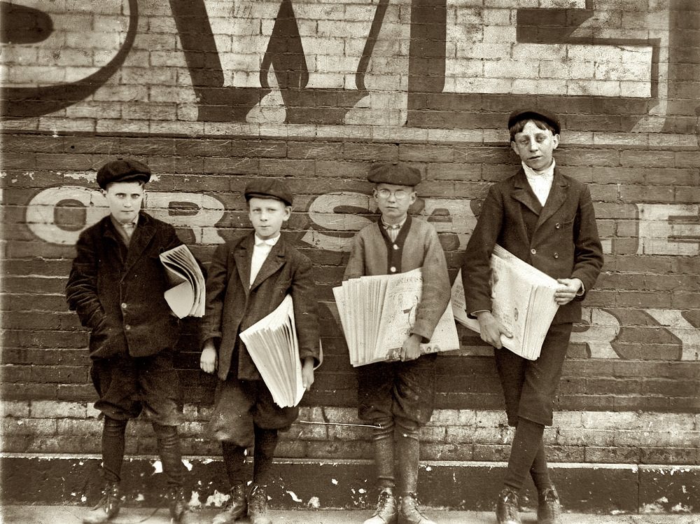 Truants like these may be found most any day between 11 a.m. & noon. Jefferson Street near Washington, St. Louis, Missouri, ,May 1910