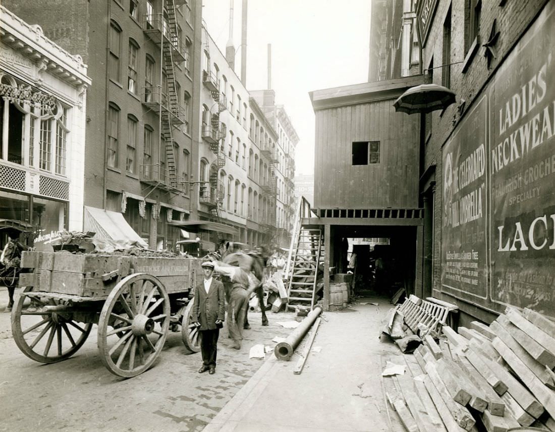 Construction work on St. Charles Street east of Seventh Street, 1900