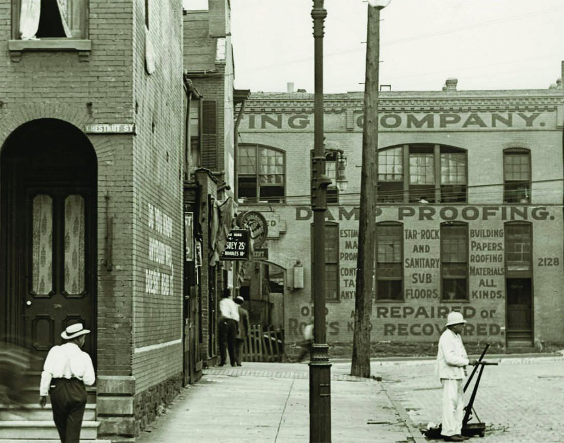 Street cleaner at Twenty-First and Chestnut streets, 1900.