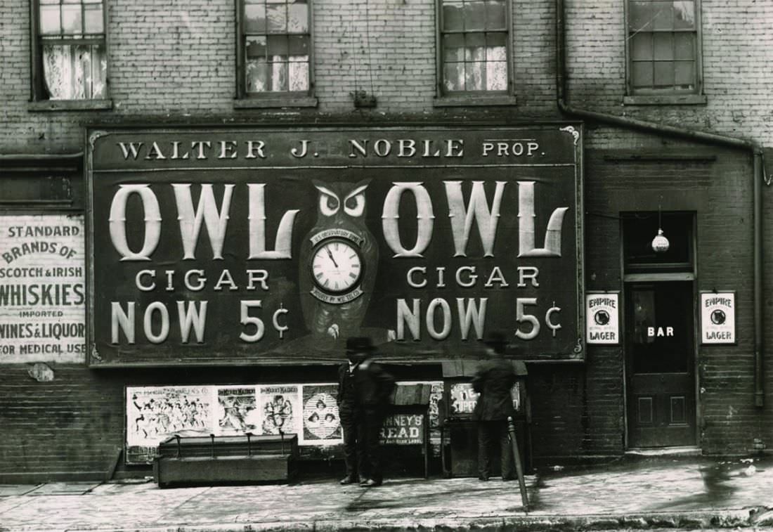 Walter J. Noble Saloon featuring an Owl Brand Cigar billboard, 2 North Eighteenth Street or 2300 Chestnut Street, 1909