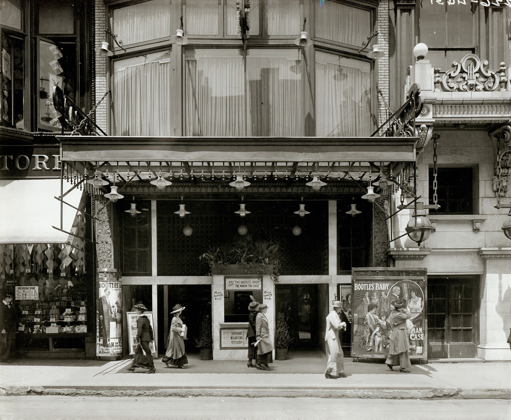 Strand Motion Picture Theater entrance at 419 North Sixth Street featuring advertisement for the movie Bootles' Baby, 1915