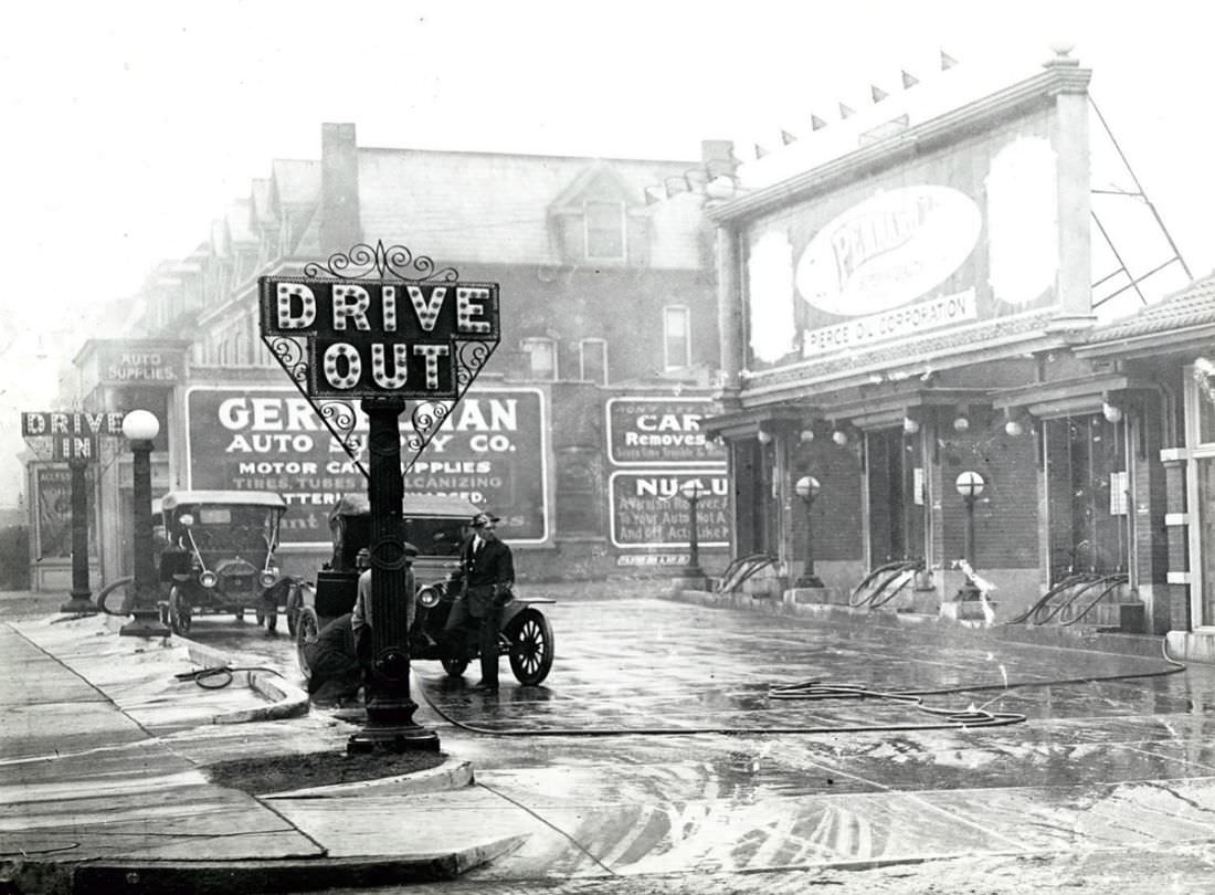 Automobile fueling at one of the first gas stations in St. Louis, operated by the Pierce Oil Company at 4614 Washington Boulevard, 1916