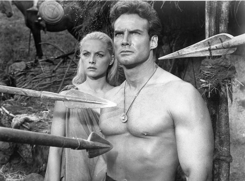 Steve Reeves with Virna Lisi in a scene from the film 'Duel Of The Titans', 1961
