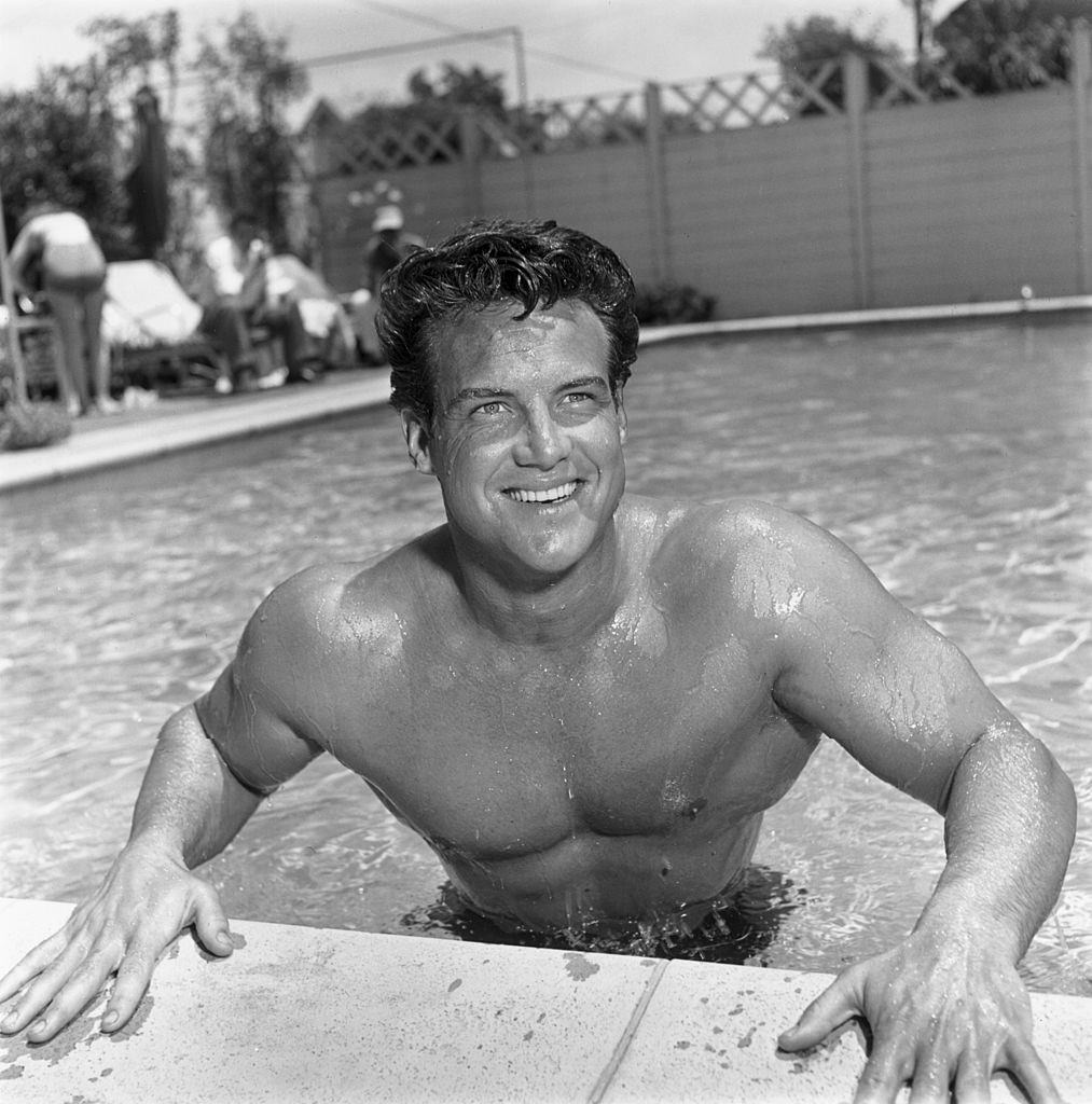 Steve Reeves in a swimming pool, 1952