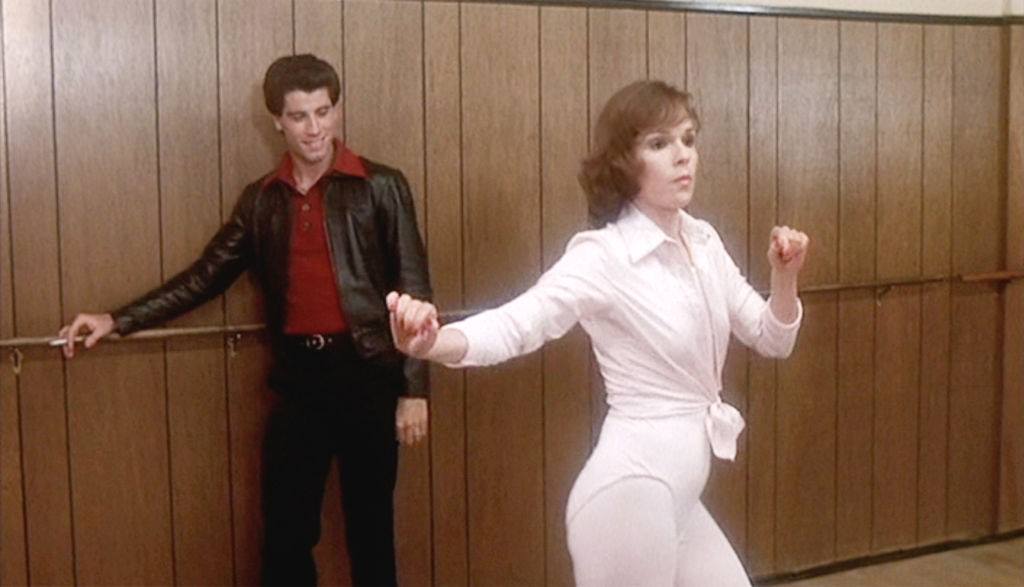 John Travolta watching Karen Lynn Gorney's moves, 1977