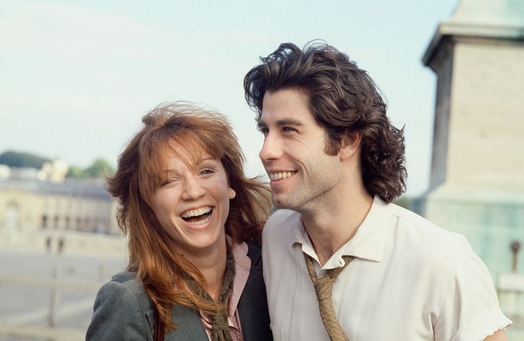 John Travolta with his fiancee, Marilu Henneron the esplanade of Versailles...