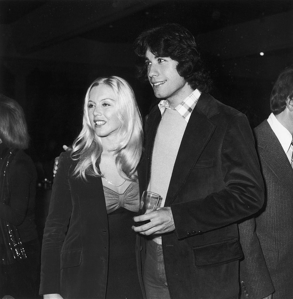 John Travolta with Lisa Farringer at the Foreign Press Club Christmas Party, held at the Beverly Hilton Hotel, Hollywood, California, 1975