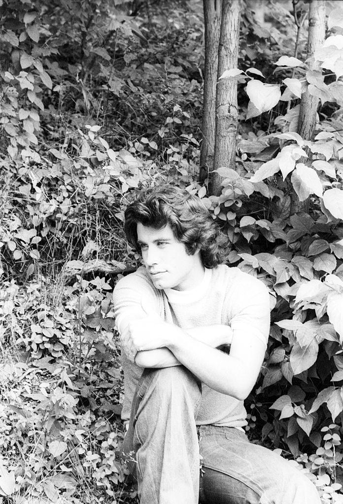 John Travolta relaxing in his garden, 1970
