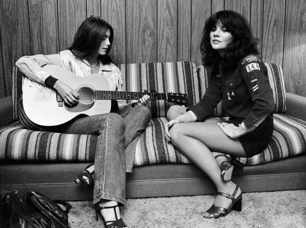 Linda Ronstadt with Emmylou Harris in Los Angeles, California, 1977