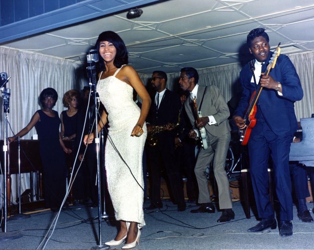 Tina Turner and Ike performing onstage with a Fender Stratocaster electric guitar in 1964 in Dallas Fort Worth, Texas.