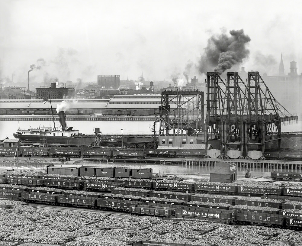 Maumee River waterfront and Railroads represented on the coal cars, 1910