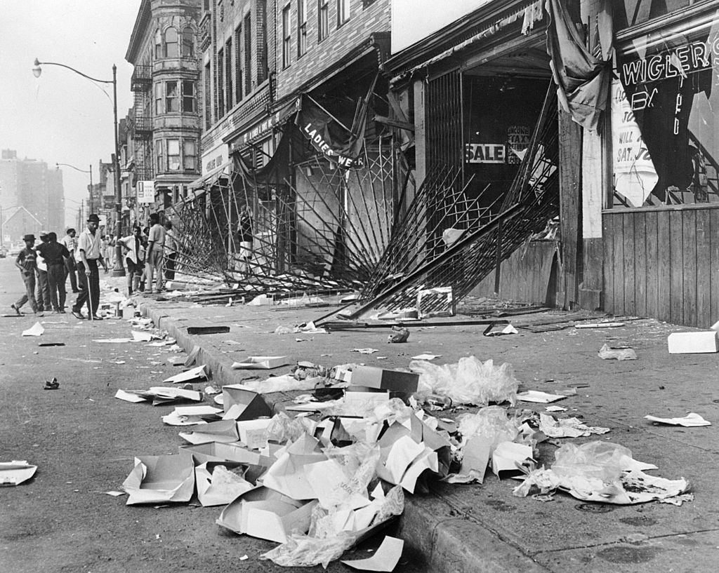 Heavy metal gratings which failed to protect shop windows during the race riots in Detroit. The rioters later burned the shops they had looted, 1967