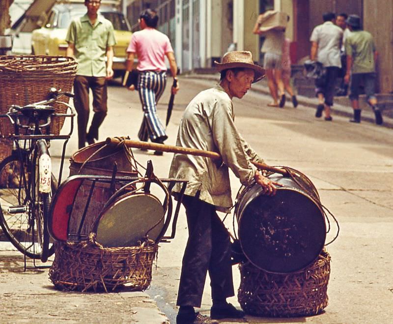 Scrap metal collector takes a rest, Hong Kong, 1970s