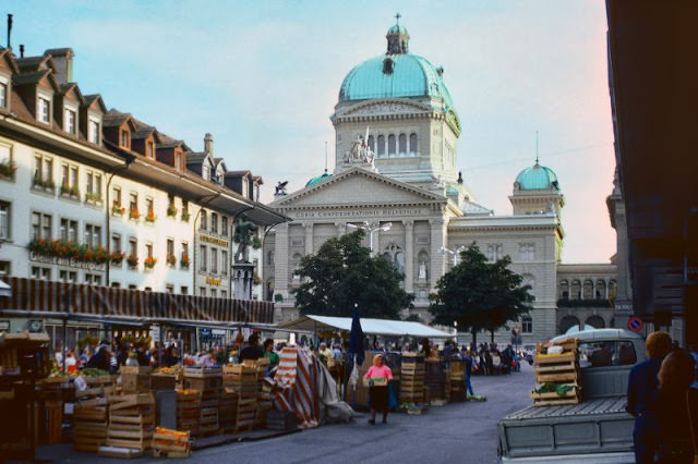 A street market in front of the National Capitol of Switzerland in Bern, Switzerland, 1980s