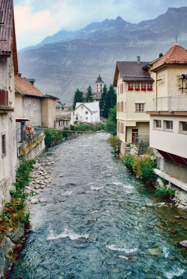 Fast flowing stream through Andermatt, Switzerland, 1980s