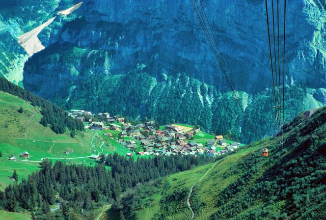 Riding up the Schilthorn cable car looking back down at Mürren, Switzerland, 1980s