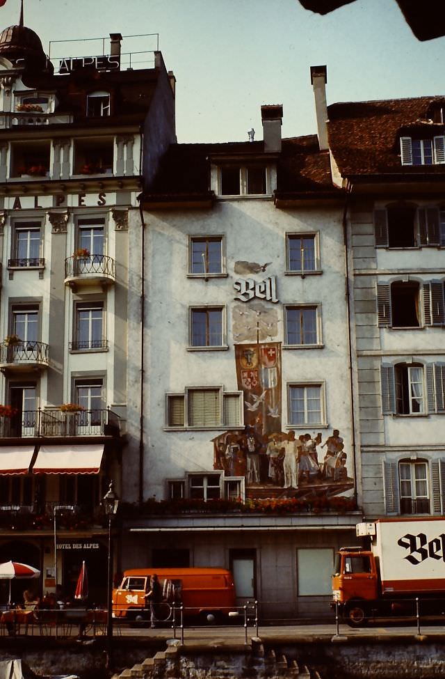 Rathausquai with at the left Hotel des Alpes. Now the 'Bell' building is a part of the hotel, with a restaurant downstairs, Lucerne, Switzerland, 1980s