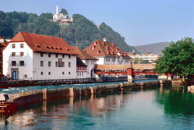 A section of the old part of Luzern, Switzerland beside the old Spreuerbrücke bridge across the Reuss River, Switzerland, 1980s