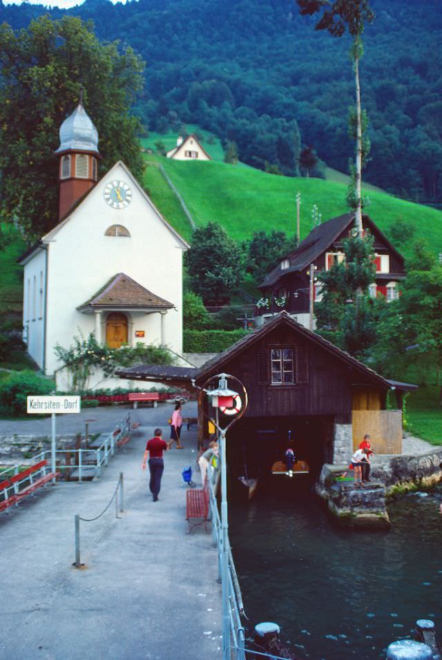 A small village on a stop of a lake steamer ship between Alpnachstad and Luzern, Switzerland, 1980s
