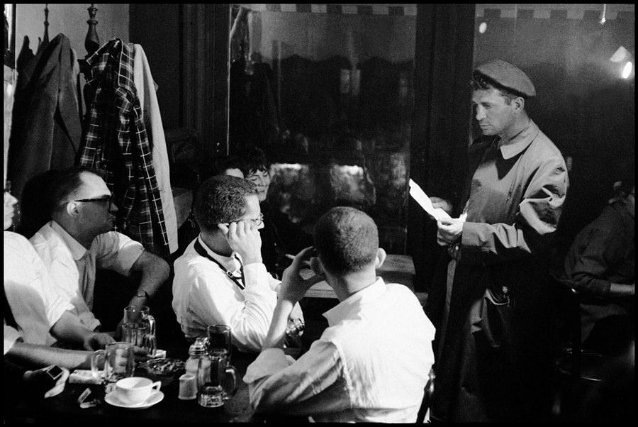 Jack Kerouac reads for an audience at the Seven Arts Cafe in 1959.