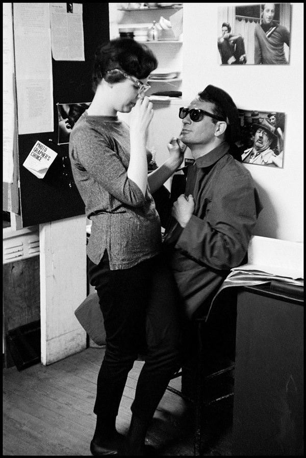 Jack Kerouac talks to a friend at a Beat party.