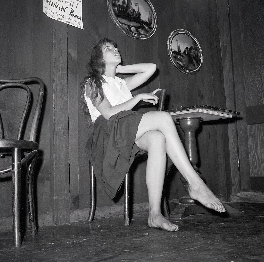 Miss Beatnik Poses in the Gaslight coffee house, 1959