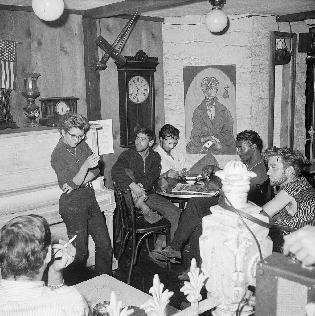 Inside the Beatnik street level coffee shop, the Beatniks make their own entertainment, 1959