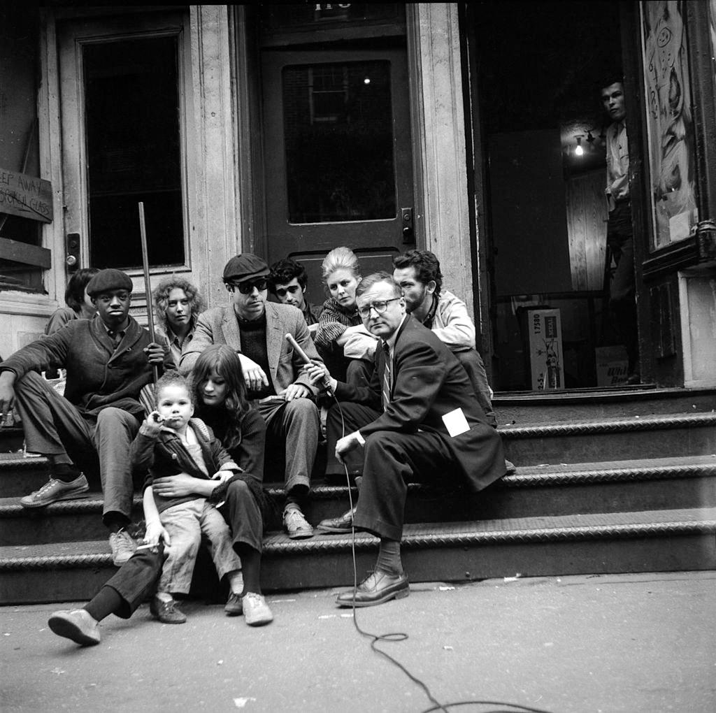 Television journalist Danny Meenan interviewing Beatnik members, New York, 1960