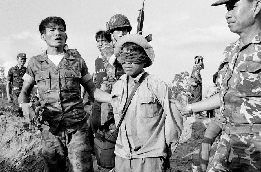 A Cambodian soldier fighting against the Khmer Rouger is captured in Thailand, Aranyaprathet, Thailand, 1985.