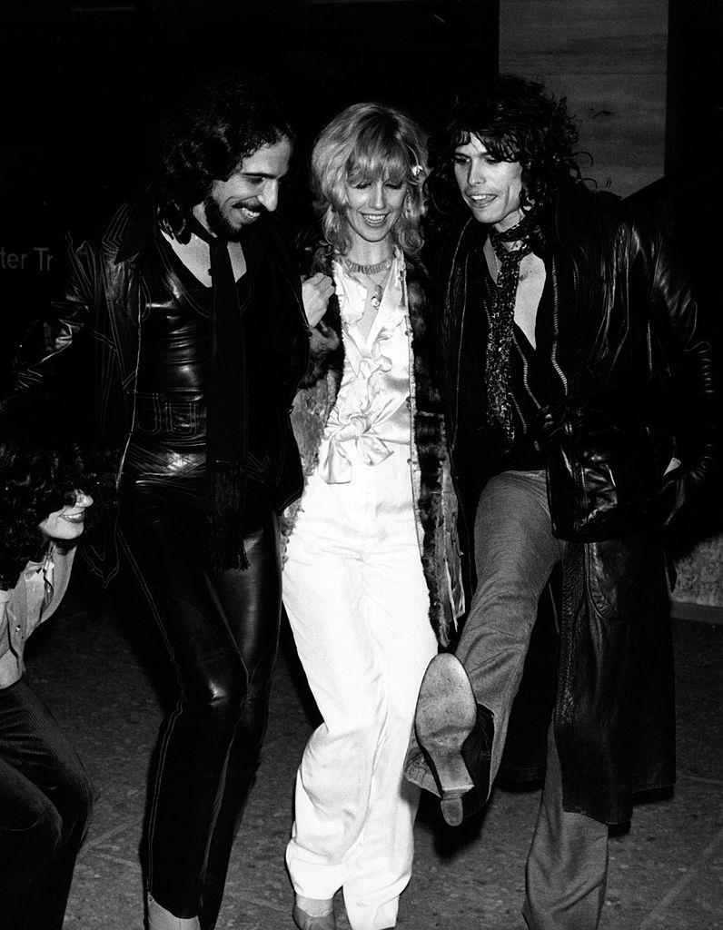 Cyrinda Foxe with Richie Supa and Steven Tyler at the opening party for "Beatlemania" on January 18, 1978 at Jade West Restaurant in New York City.