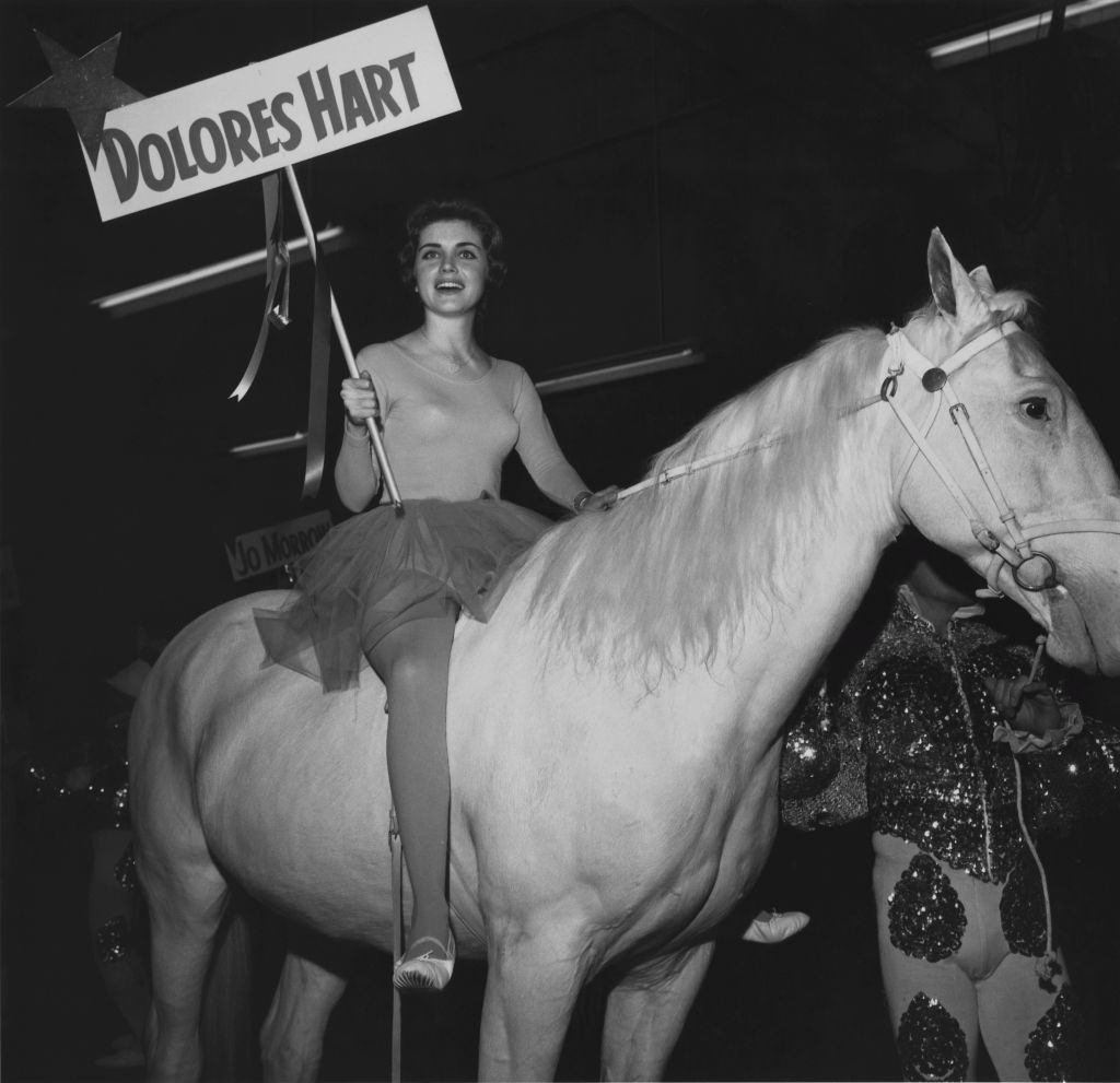 Dolores Hart takes part in a parade at the opening of the Dobritch International Circus at the Los Angeles Arena, 1962