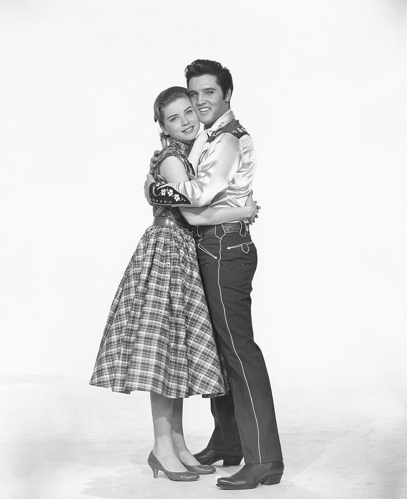 Dolores Hart with Elvis Presley promoting the movie Loving You, 1957