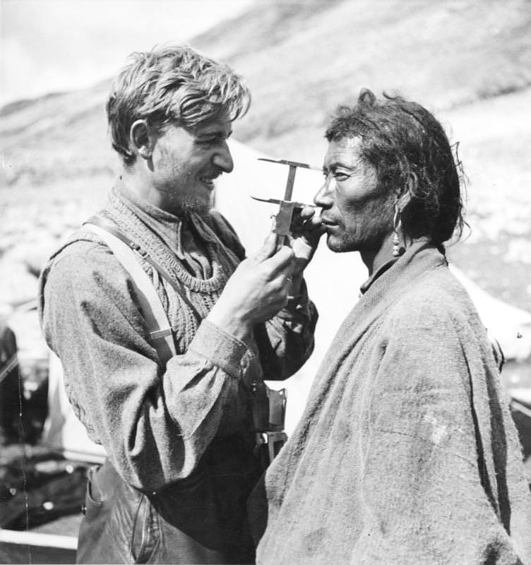 Bruno Beger measures the facial characteristics of a Tibetan man, Tibet, 1938