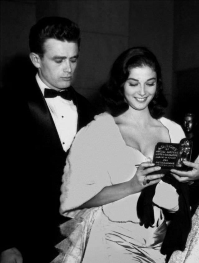 James Dean with Pier Angeli at the premiere of the re-release of 'Gone With The Wind' in Los Angeles, 1954