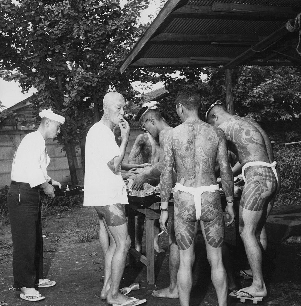 A group of heavily tattooed men, Japan, 1955