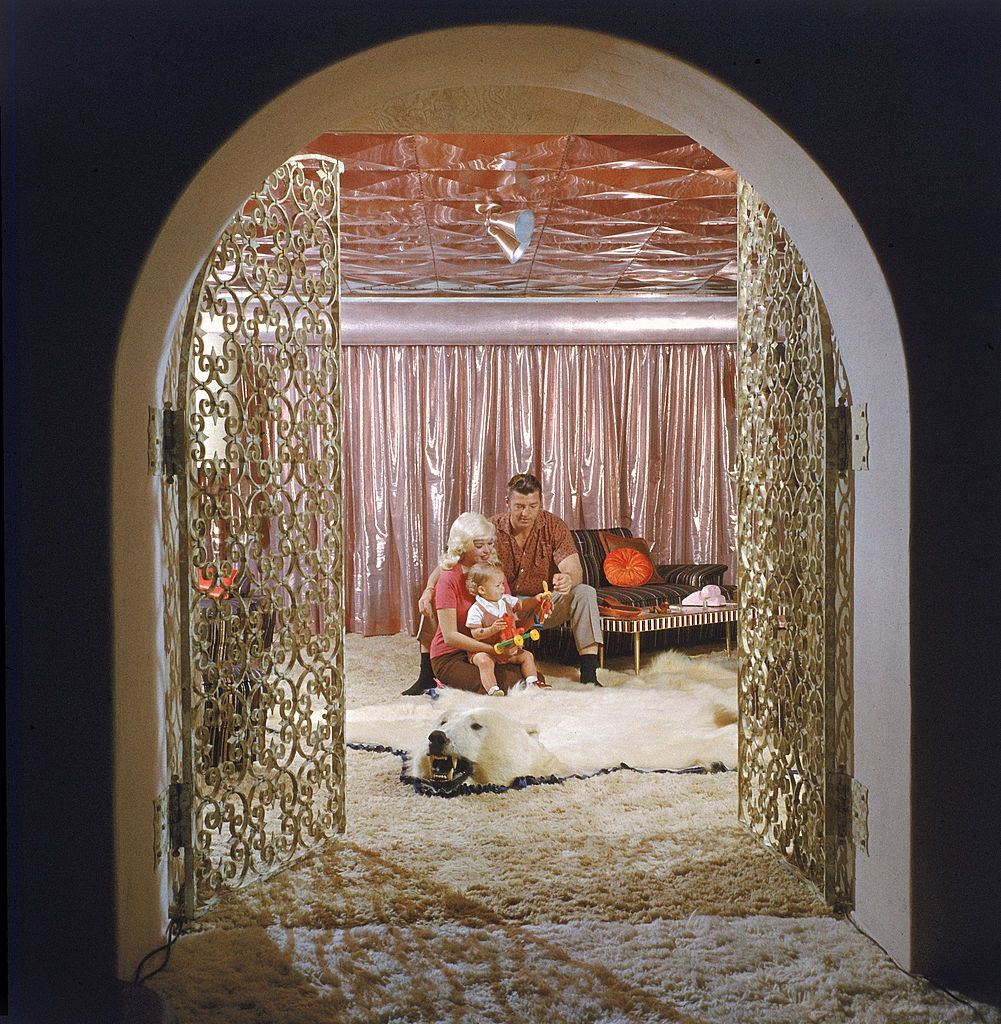 Jayne Mansfield with her son Miklos Hargitay Jr, and husband, Mickey Hargity  in their pink palace, 1960s