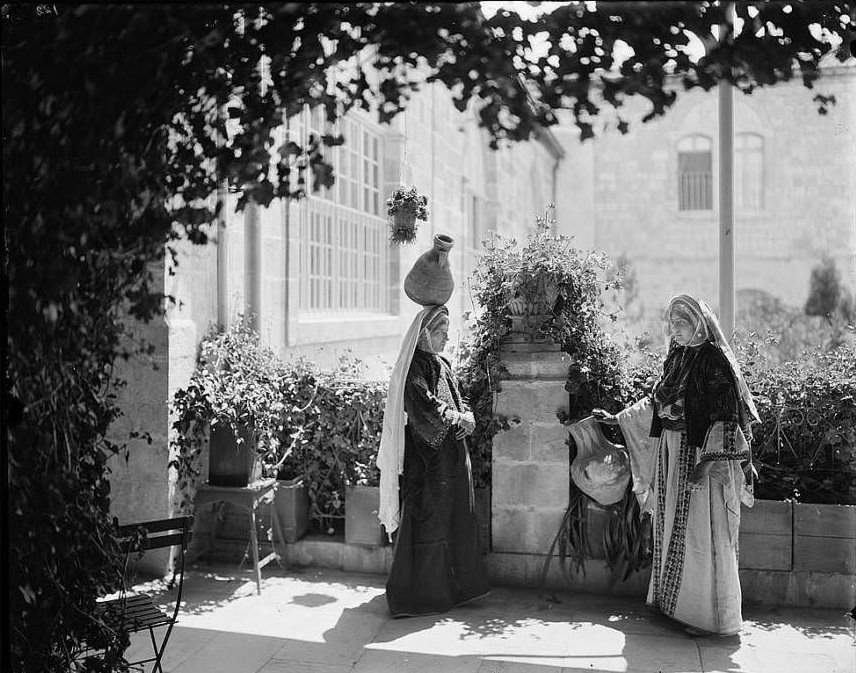 Two women stop to talk.Ramallah, Circa 1898-1914